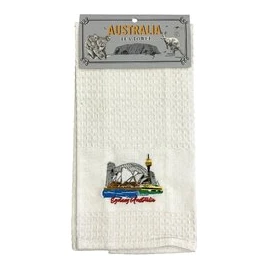 White waffle tea towel with an embroidered Sydney skyline, Opera House and Harbour Bridge, on an Australia header card
